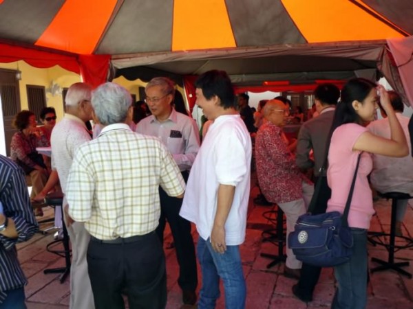 Guests chatting with friends while awaiting the arrival of Guest of Honour, Y. B. Danny Law.