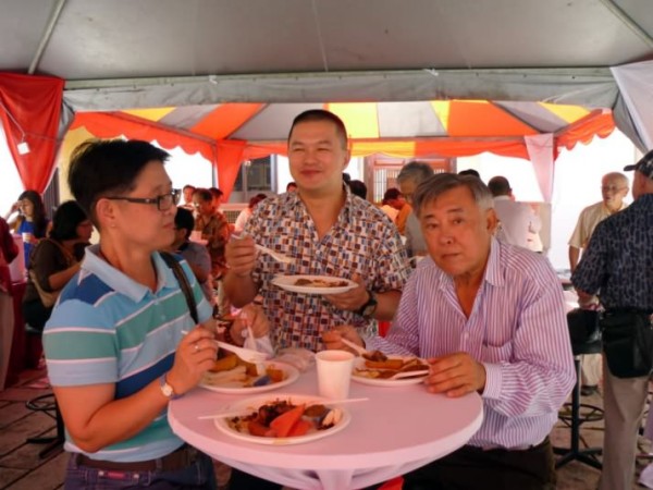 Wendy Khoo, Douglas Khoo and Khoo Kay Hock enjoying the snacks and refreshment after the Opening Ceremony.