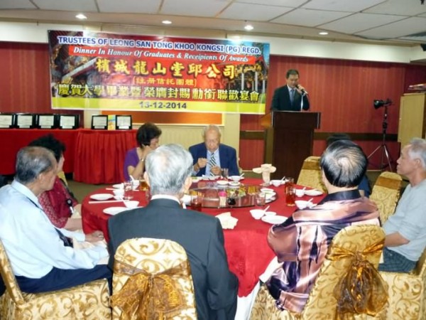 Master-of-Ceremony, Khoo Lean Huat welcoming guests to the Annual Dinner of Leong San Tong Khoo Kongsi, Penang.