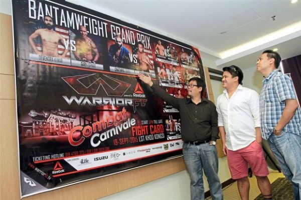 Action-packed: (From left): The championship organising chairman David Khoo, person-incharge also David Khoo, and the chief executive officer Dominic Dorall discussing the fighter line-up after the press conference.